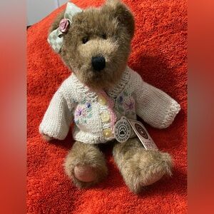 This collectible item is a Boyds Bear named Florimae Bearley,  is now retired.